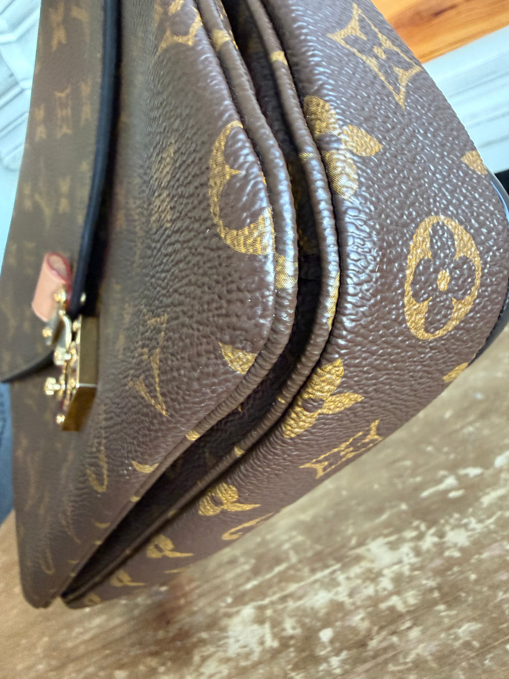 Pochette Métis in Monogram