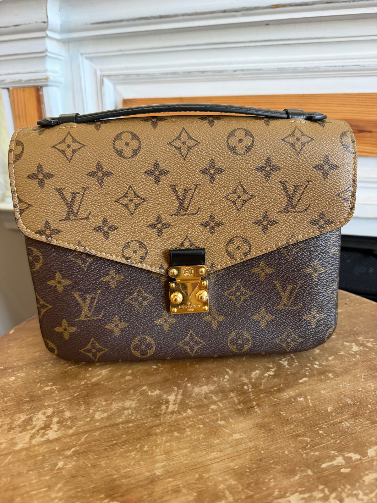 Pochette Métis in Reverse Monogram