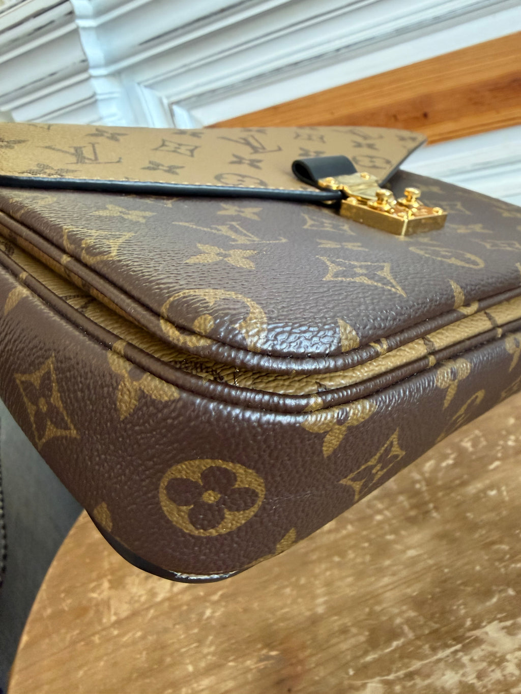 Pochette Métis in Reverse Monogram