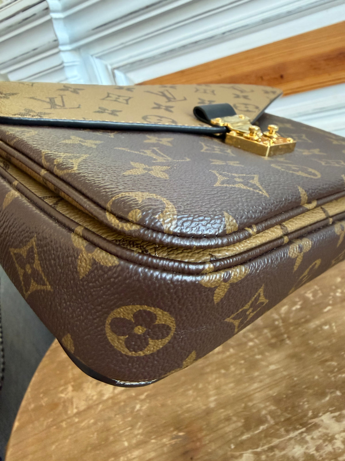 Pochette Métis in Reverse Monogram