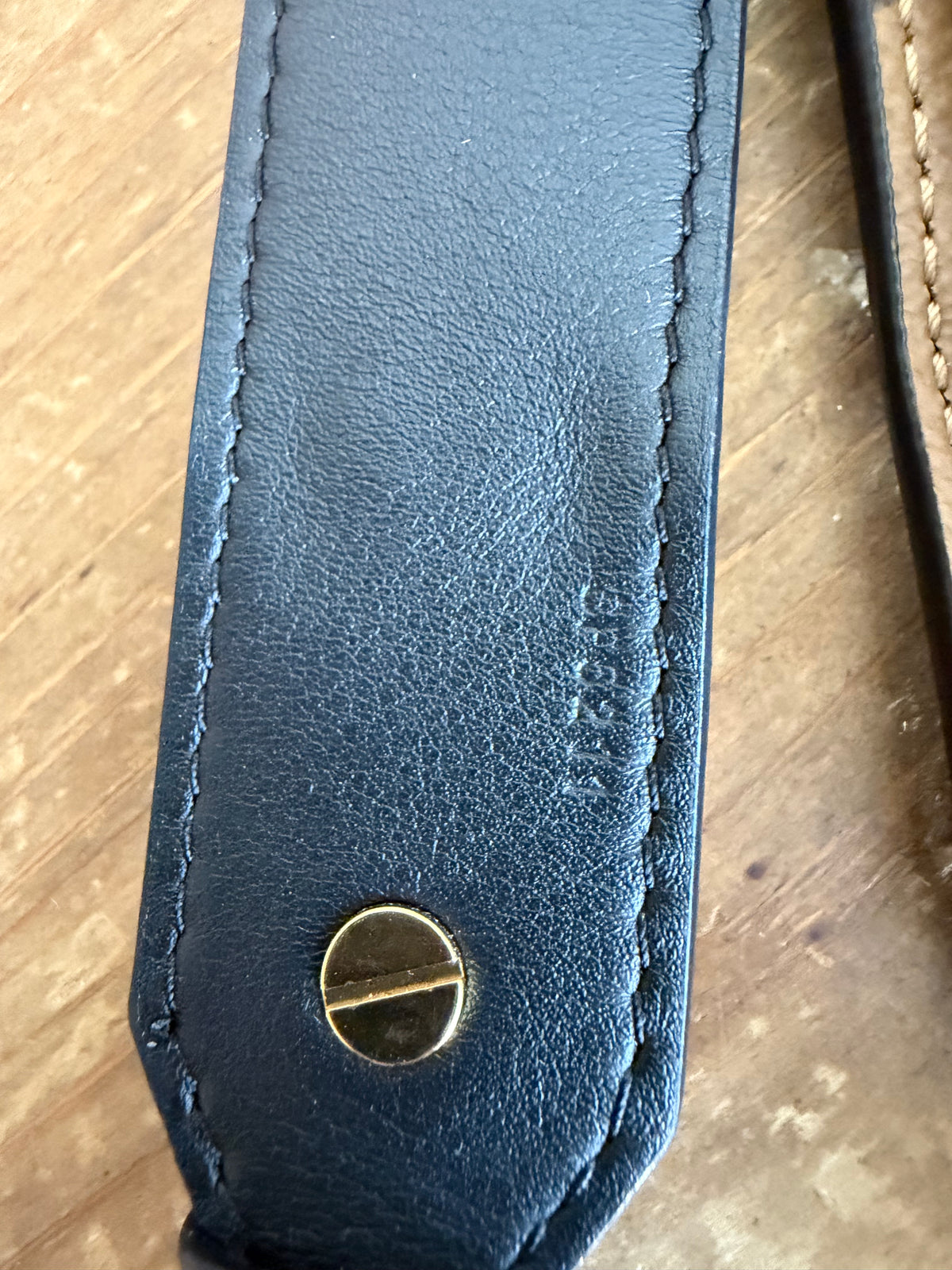 Bandouliere adjustable reverse mono and black leather strap