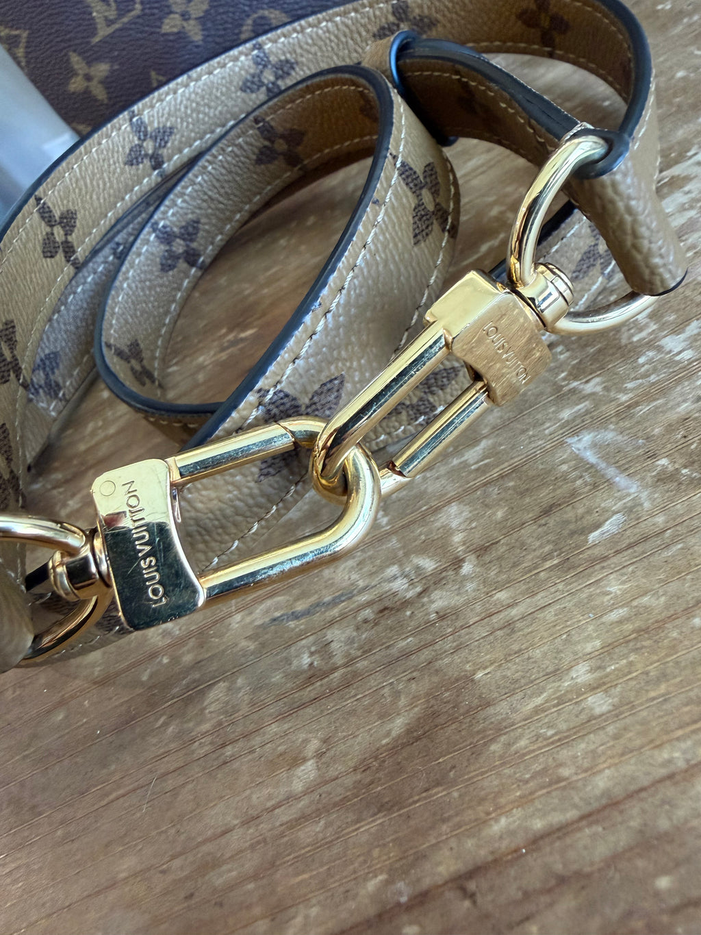Pochette Métis in Reverse Monogram