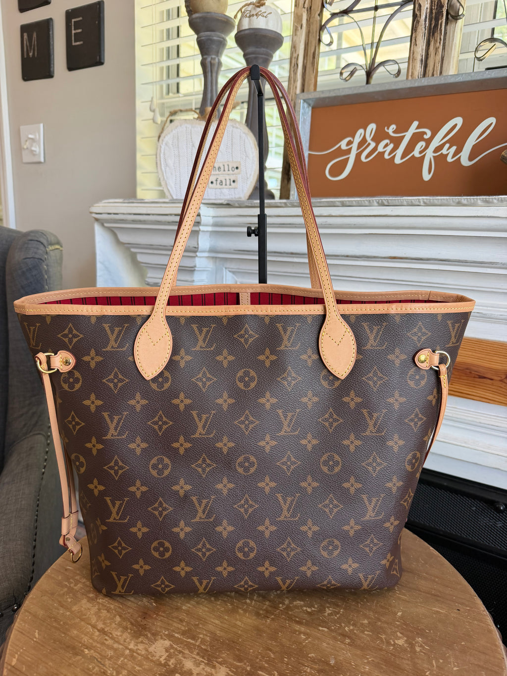 Neverfull MM with Pouch in Monogram with Red Interior