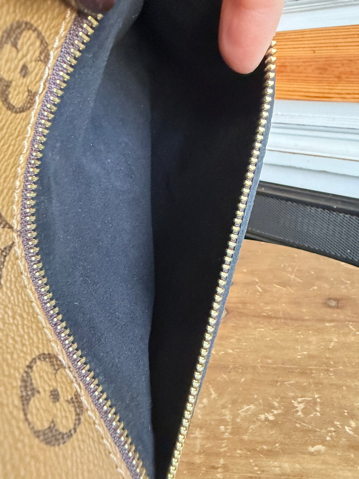 Pochette Métis in Reverse Monogram