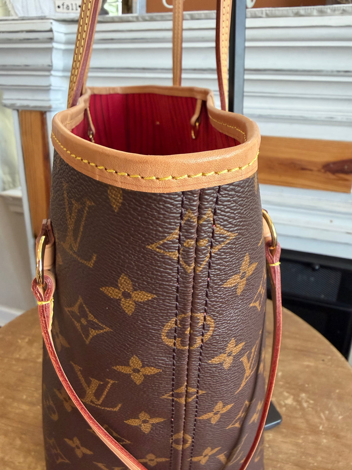 Neverfull MM with Pouch in Monogram with Red Interior