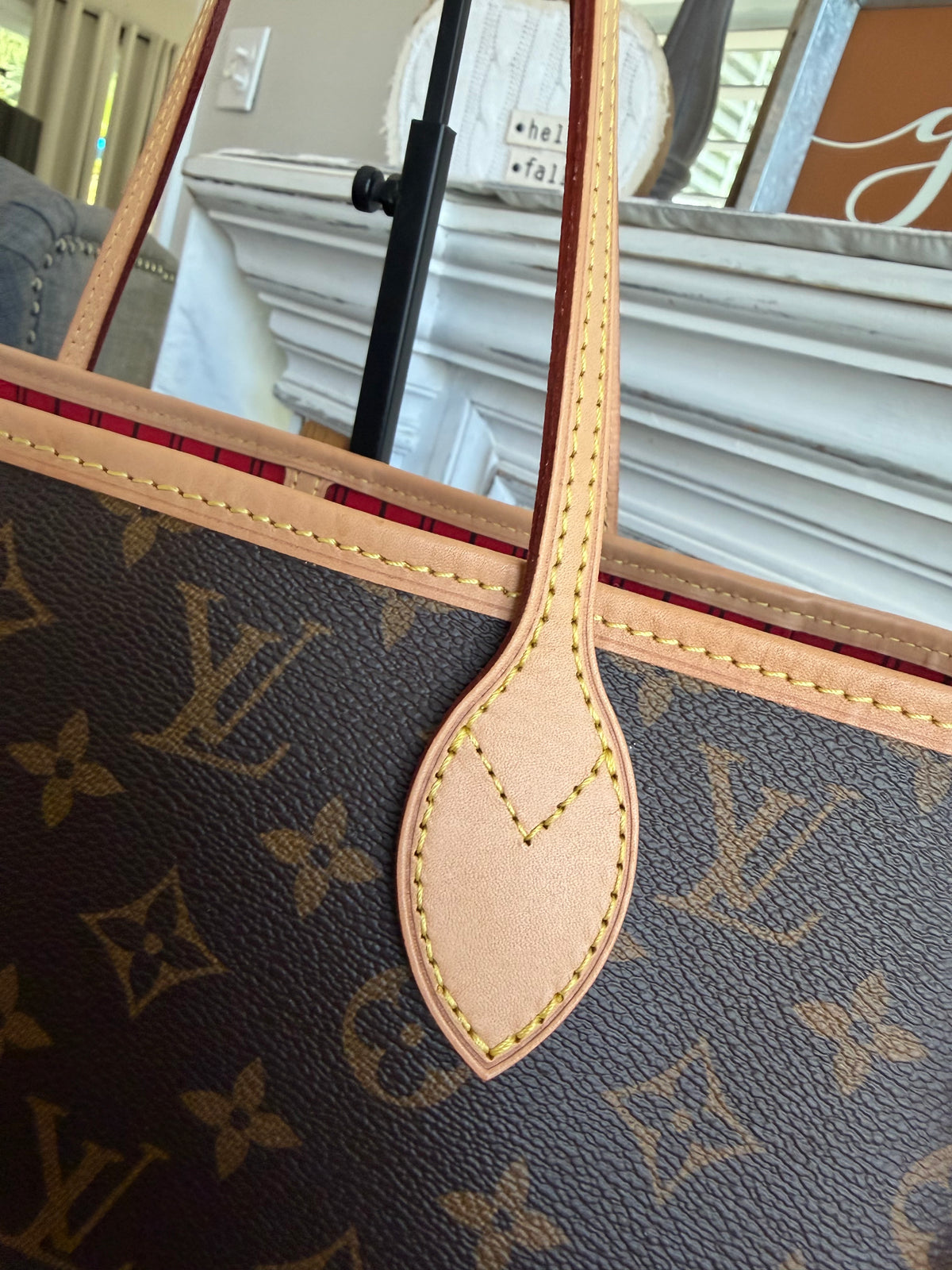 Neverfull MM with Pouch in Monogram with Red Interior