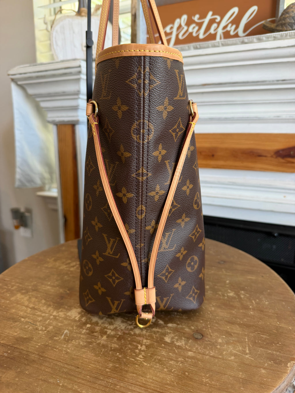 Neverfull MM with Pouch in Monogram with Red Interior