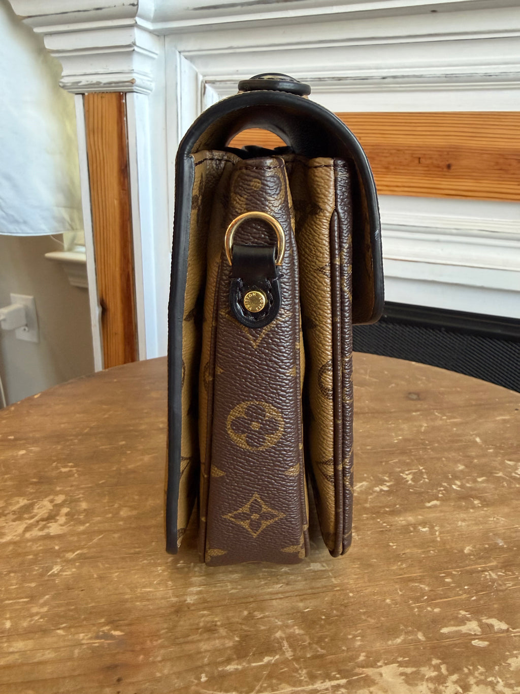 Pochette Métis in Reverse Monogram