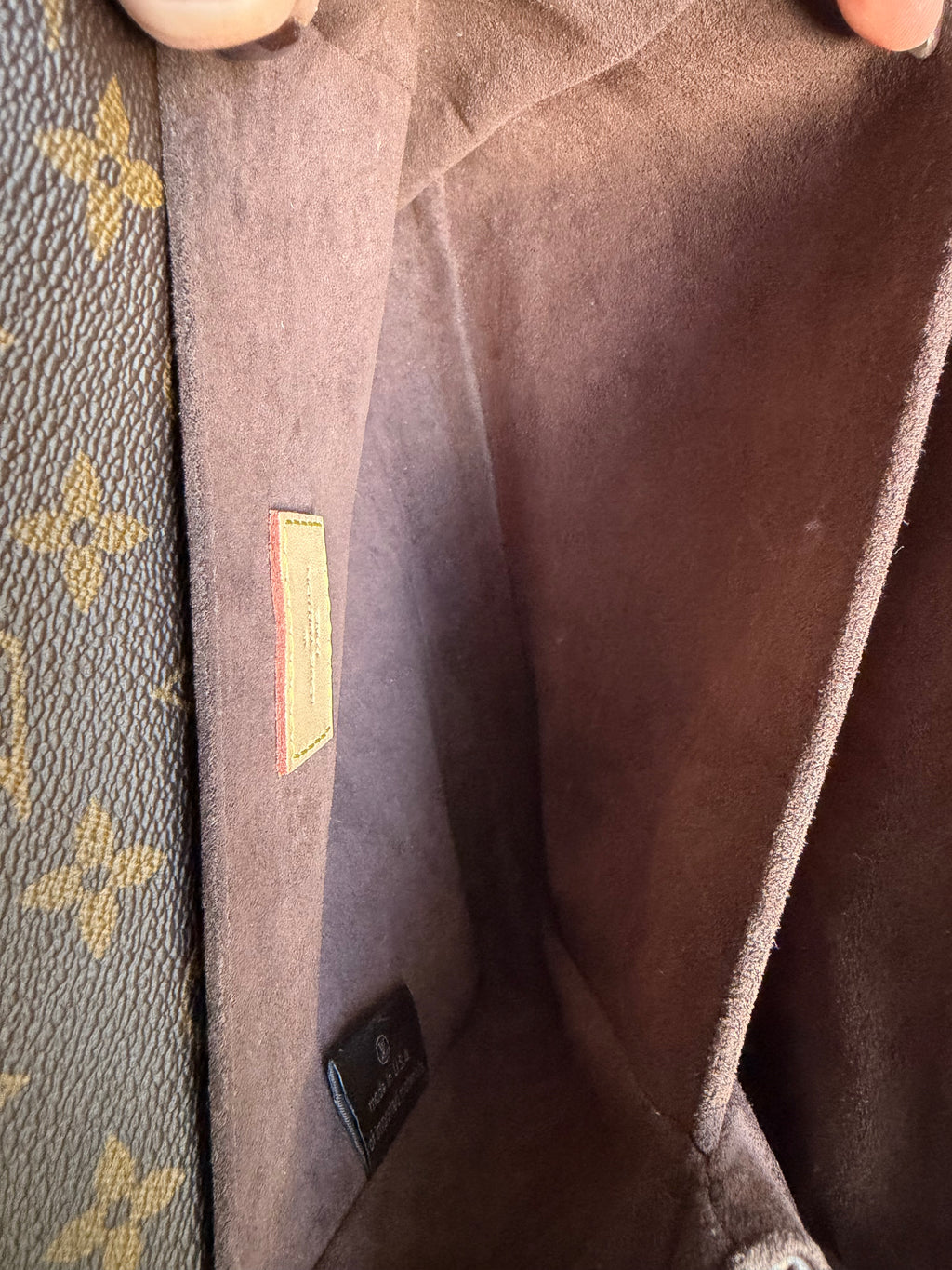 Pochette Métis in Monogram