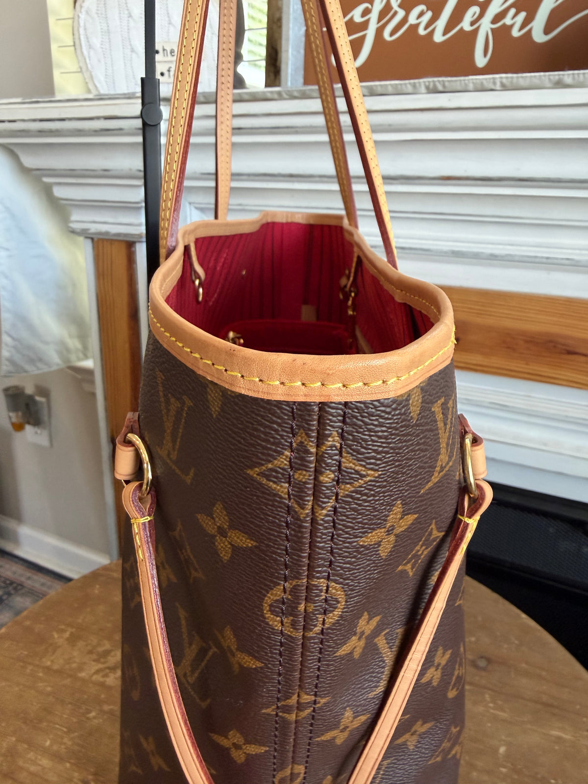 Neverfull MM with Pouch in Monogram with Red Interior