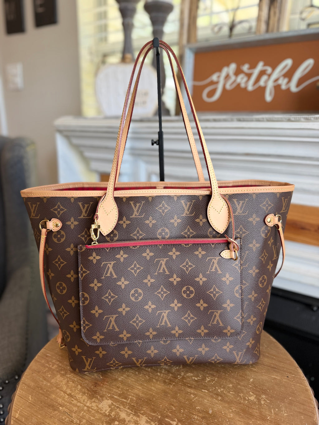 Neverfull MM with Pouch in Monogram with Red Interior