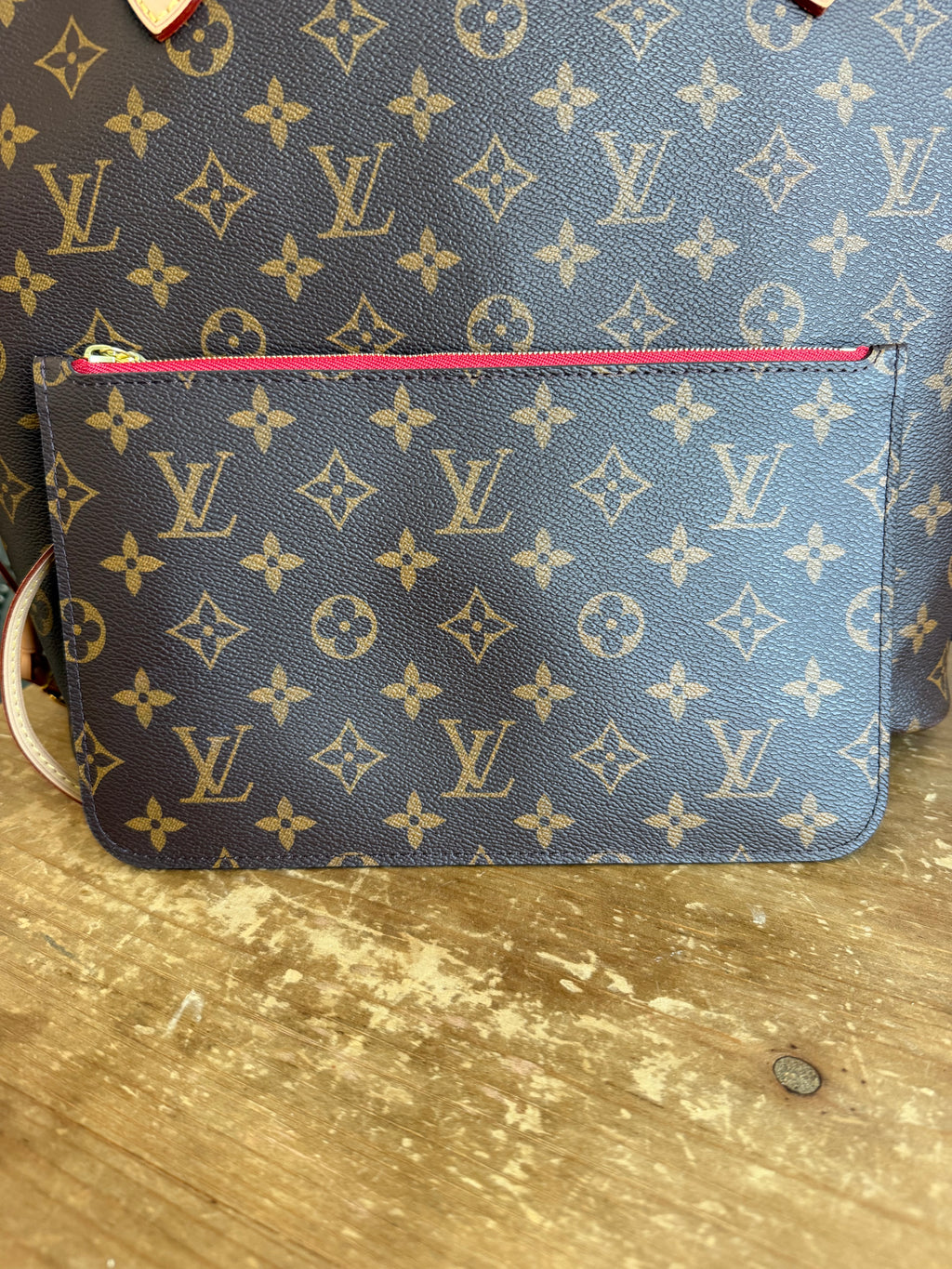 Neverfull MM with Pouch in Monogram with Red Interior